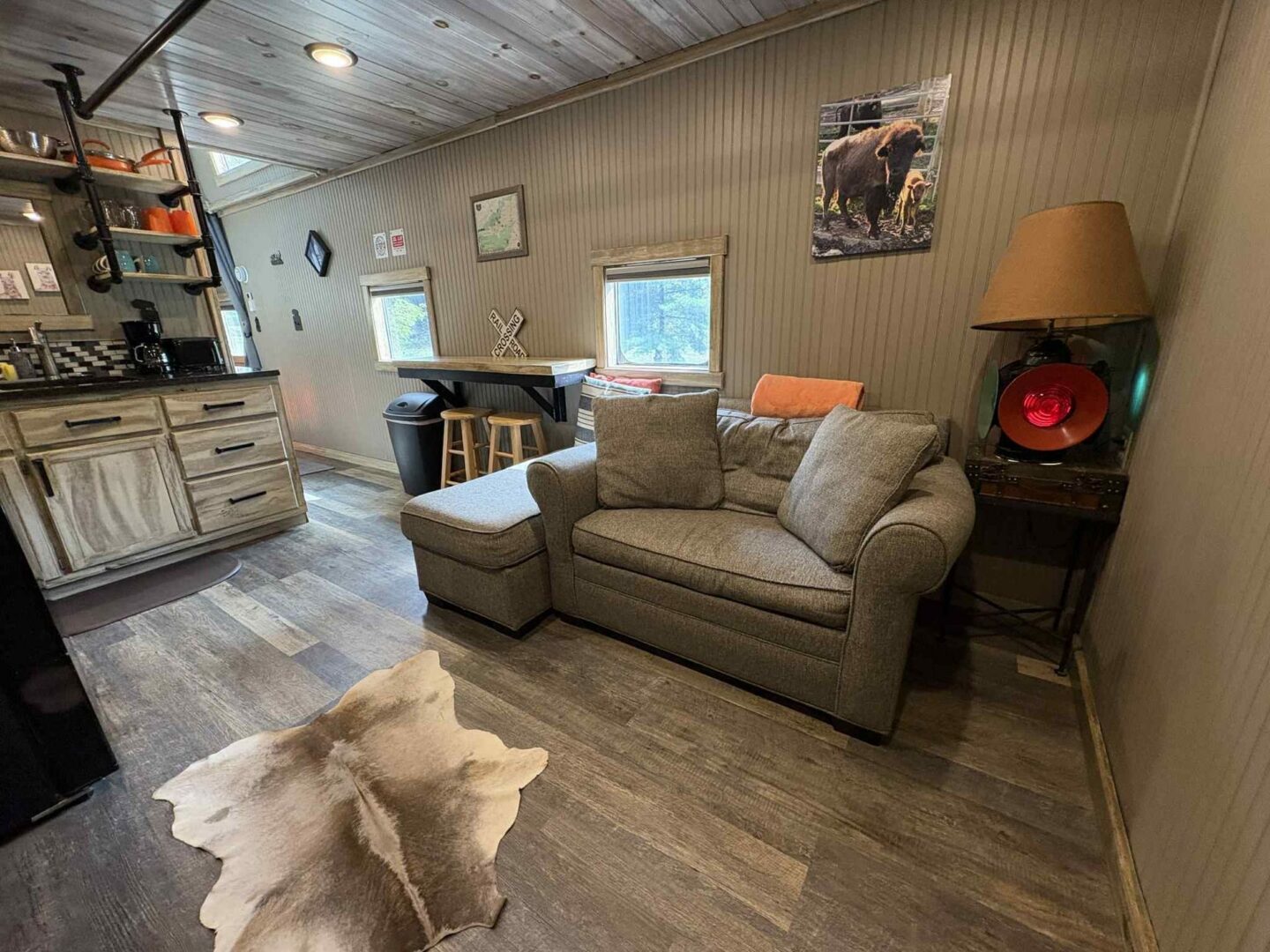 Cozy living area with couch and decor.