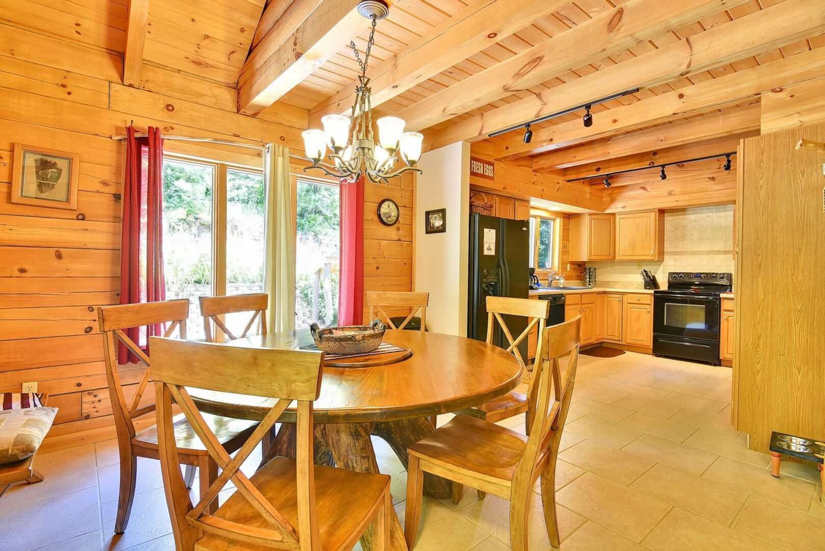 Rustic kitchen with wooden dining table set.