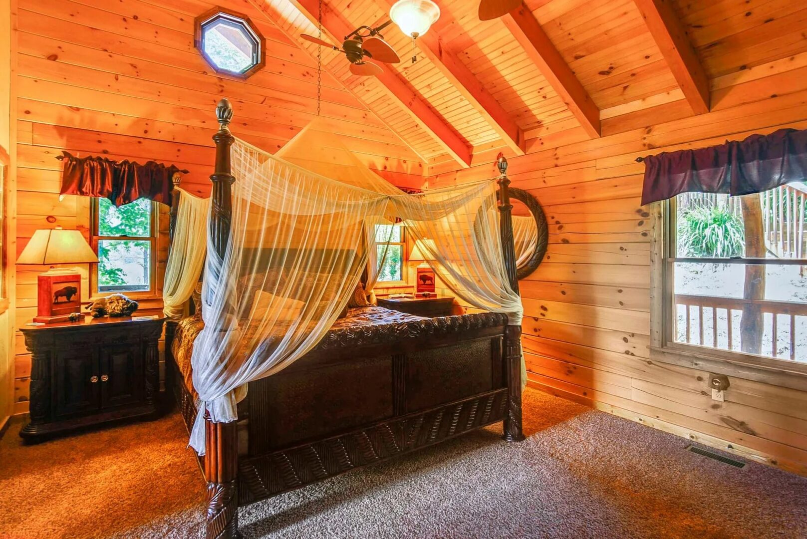 Cozy cabin bedroom with canopy bed.