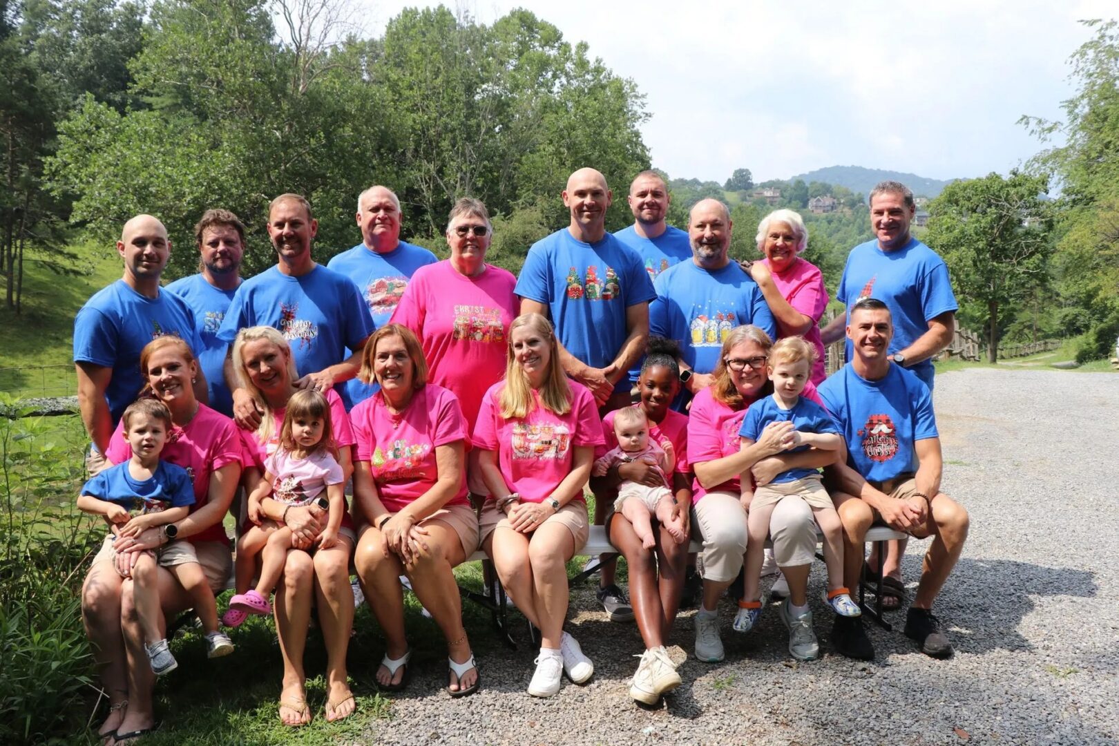 Large family group photo outdoors.