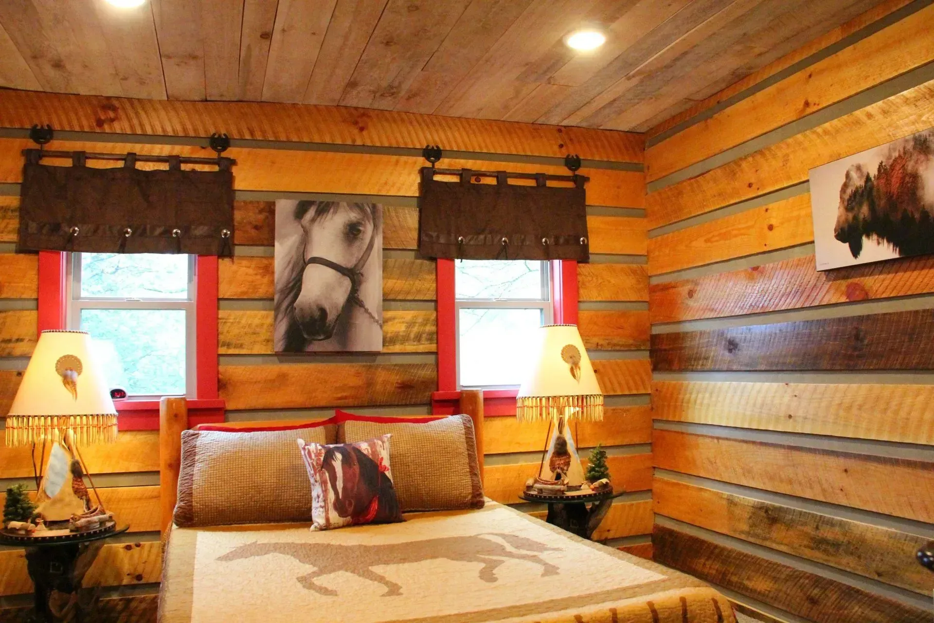 Rustic bedroom with horse-themed decor.