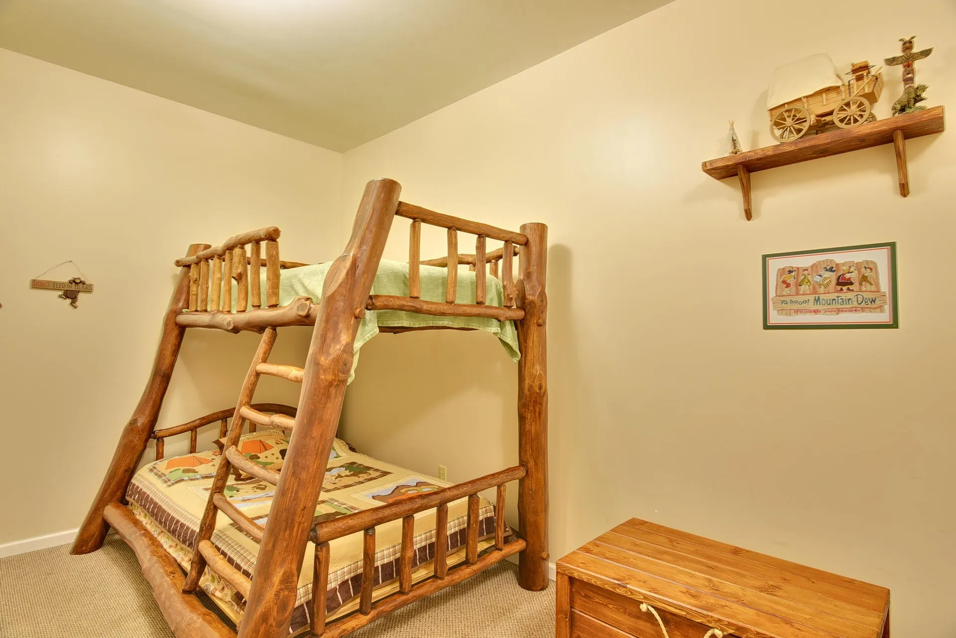 Rustic bunk bed in a themed room.
