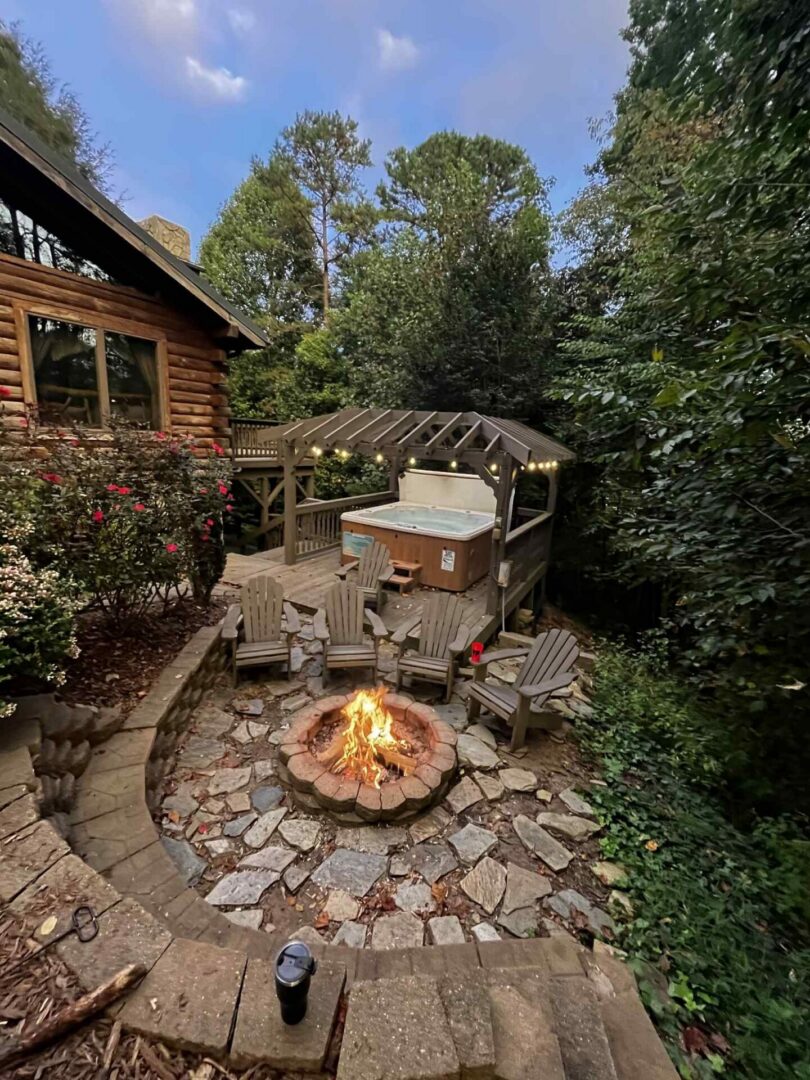 Outdoor fire pit and hot tub area.